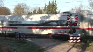 German high speed train (ICE3) and Dutch railroad crossing