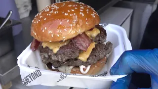 Double Burger and Bacon Dripping Melted Cheese. London Huge Burgers of Camden Town