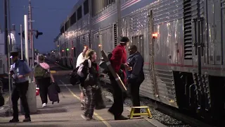 May 27 2024, Amtrak California Zephyr makes stop at Fort Morgan ,   A piddle break for two dogs.