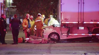 Pomona, CA: Nissan Altima Slams Into Semi-Trailer Trapping Driver