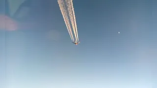 Airbus A380 with contrails