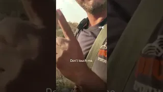 Armed Israeli settler guard filmed harassing Palestinian child in West Bank