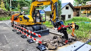 Road repair. Liebherr A918 compact RC excavator, Rototilt R4, Mercedes sprinter RC scale models