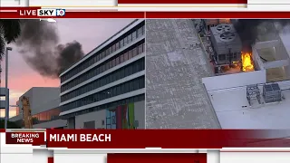 Black smoke comes from Miami Beach Convention Center's roof fire