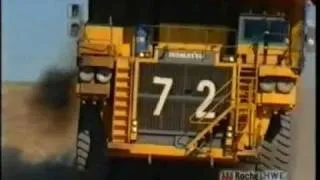 dump truck running over a four wheel drive in Queensland