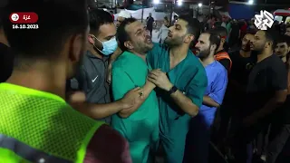 شاهد.. طبيب فلسطيني ينهار باكيا بعد وصول جثماني والده وشقيقه إلى المستشفى الذي يعمل فيه
