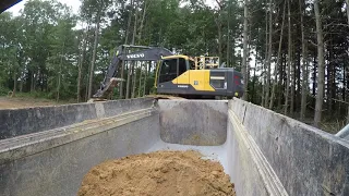 Loading And Hauling Dirt From The Pond