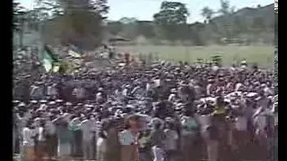 Mandela walking out of prison with Winnie