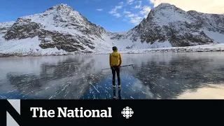 #TheMoment Alaskan skaters glide over astonishingly clear ice on an alpine lake