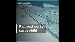 Railroad worker saves child from oncoming train