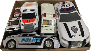 A Box Full of Police Cars Mini Car Lined Up Checked One by One Run on for Emergency Rescue Mission