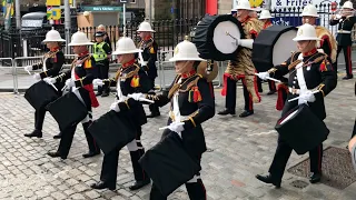 The Bands of HM Royal Marines march down Edinburgh's Royal Mile in black after the Queen's death