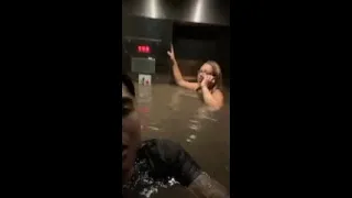 People trapped in flooding elevator in Omaha