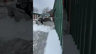 Snow plowing storage units close call