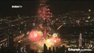 Dubai lights up world's tallest building in New Year firework show