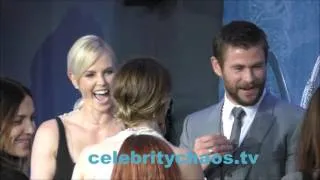 Actress Charlize Theron gets caught smelling Actor Chris Hemsworth