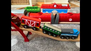 Build a wooden train set and watch toy trains