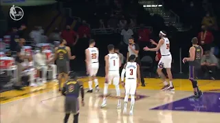 Javale McGee blocks Ben McLemore’s shot out of bounds, then retrieves it to sign an autograph