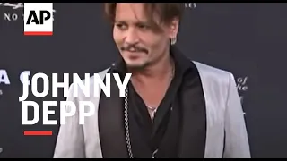 Orlando Bloom and Jerry Bruckheimer defend Johnny Depp at “Pirates” Hollywood premiere, young stars