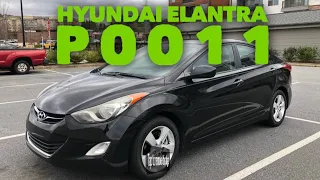2012 Hyundai Elantra Intake VVT solenoid remove and clean fixed P0011 code.