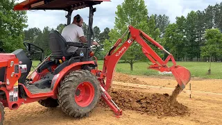 Digging with Kubota b2601 backhoe