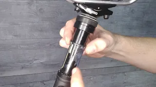 E* Thirteen Vario Infinite Dropper Post and 1X Lever. Close up look and travel adjustment guide.