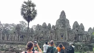 Roam in Angkor Thom (Bayon Temple and Tonle Om Gate) and Bakheng Temple, Cambodia