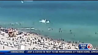 Beach reopens after helicopter crash that injured 2 amid FAA investigation