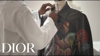 Hand-painting brings literature to leather for Dior men's Fall 2022