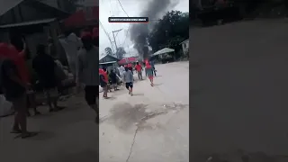 Barangay Anunas residents set fire to a truck during a demolition in their area