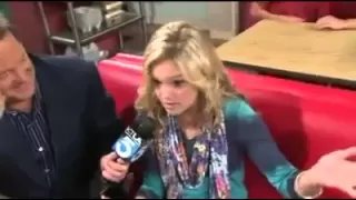 Olivia Holt   Mateo Arias arm wrestle on the set of Kickin' It.