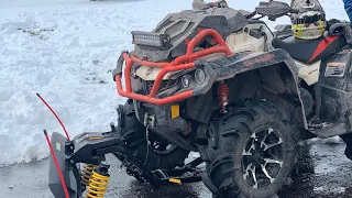 Can Am 850 Xmr plowing snow(Alpine Flex Plow)