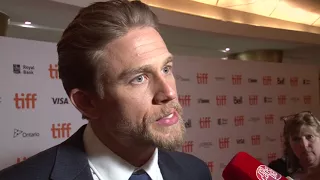 Papillon: Charlie Hunnam Exclusive Interview TIFF 2017 | ScreenSlam