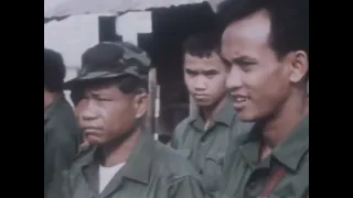 Pathet Lao Defectors Report to Royal Lao Police Camp in Pakse, 1971