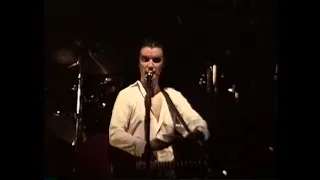 David Byrne throwing condoms at audience (1992)