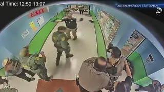 New hallway footage in Uvalde school shooting shows police response