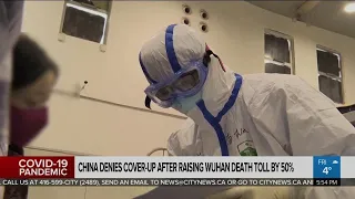 China denies coverup after releasing revised coronavirus death toll