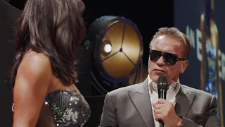 Arnold Schwarzenegger shows Jenny Powell how to become The Terminator