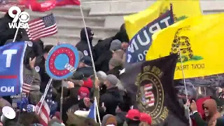 Pro-Trump supporters break down barricades and storm U.S. Capitol