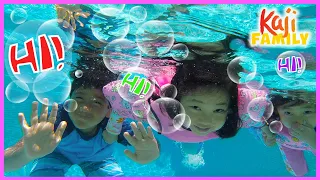 Ryan Emma and Kate swimming in  the Pool