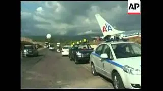 AA plane overshoots runway, injuring many, aerials, presser