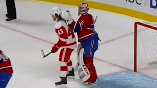 Carey Price Tips Darren Helm's Helmet (10/21/14)