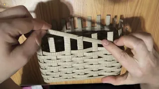 Birch paper weaving. The basket is woven from cardboard