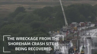 Crane starts to remove wreckage from Shoreham crash scene