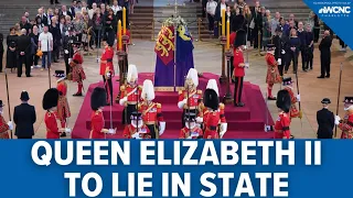 Queen Elizabeth II lies in state after solemn procession