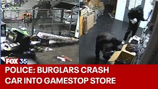 Video shows suspected burglars crash SUV into Orlando GameStop, police say