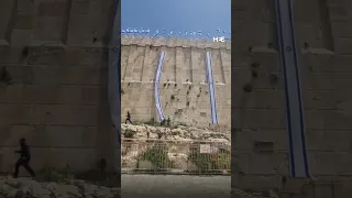 Israel hangs Israeli flags on Hebron’s Ibrahimi Mosque