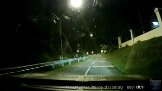 scary ghost sighting at Bukit Tunku, dashcam captures ghost sitting the middle of the road