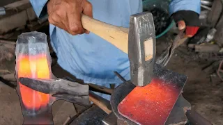THE BLACKSMITH MAKES A HAMMER FOR HIS WORK