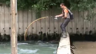 Crazy Man fight big Catfish over a dam by Catfish World